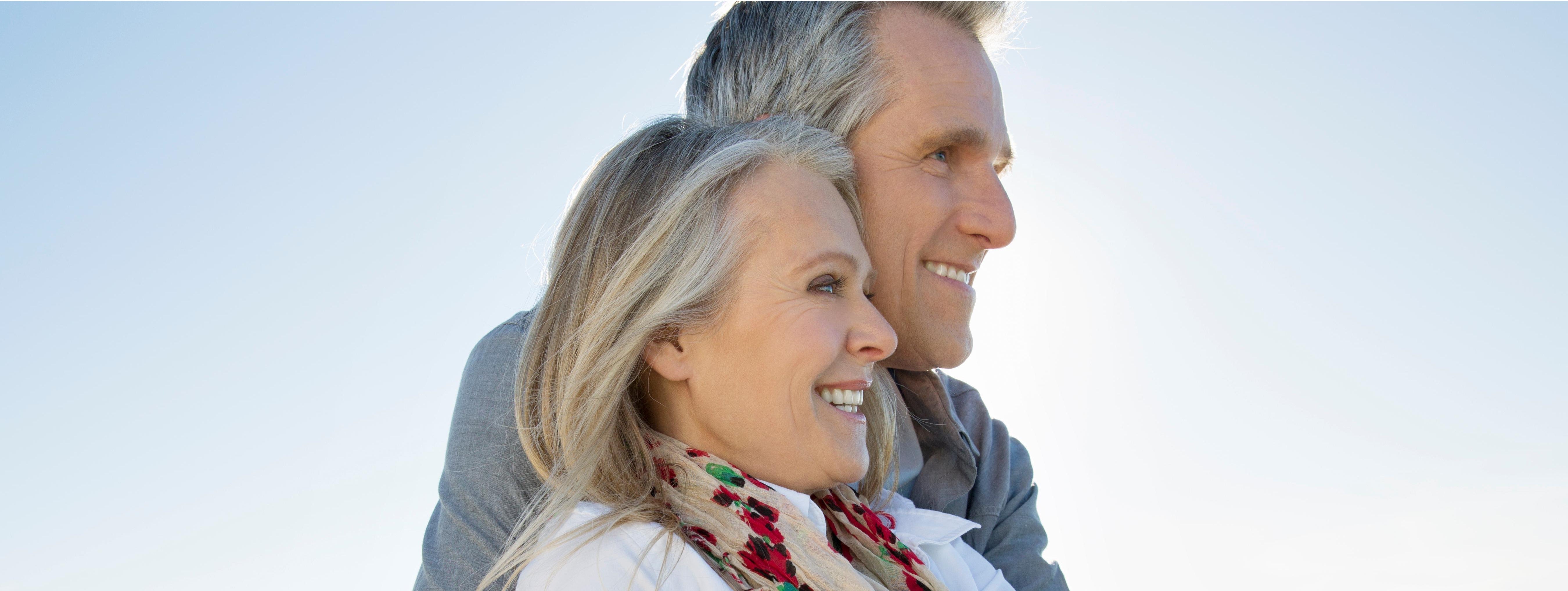 Couple embracing at beach